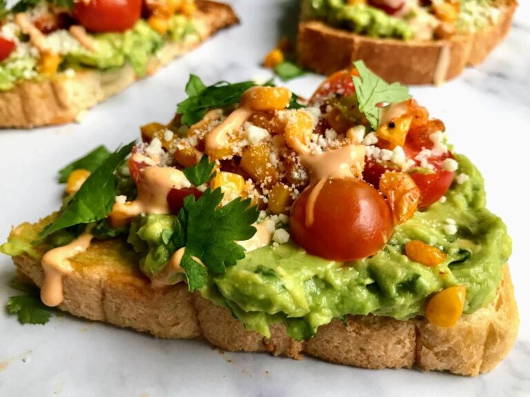 avocado toast with tomatoes and corn.